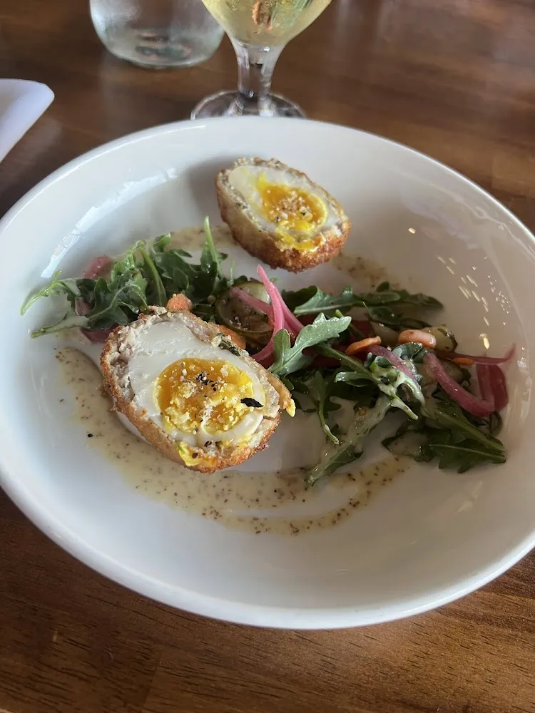 Warm Scotch Egg with Arugula and Bourbon Mustard